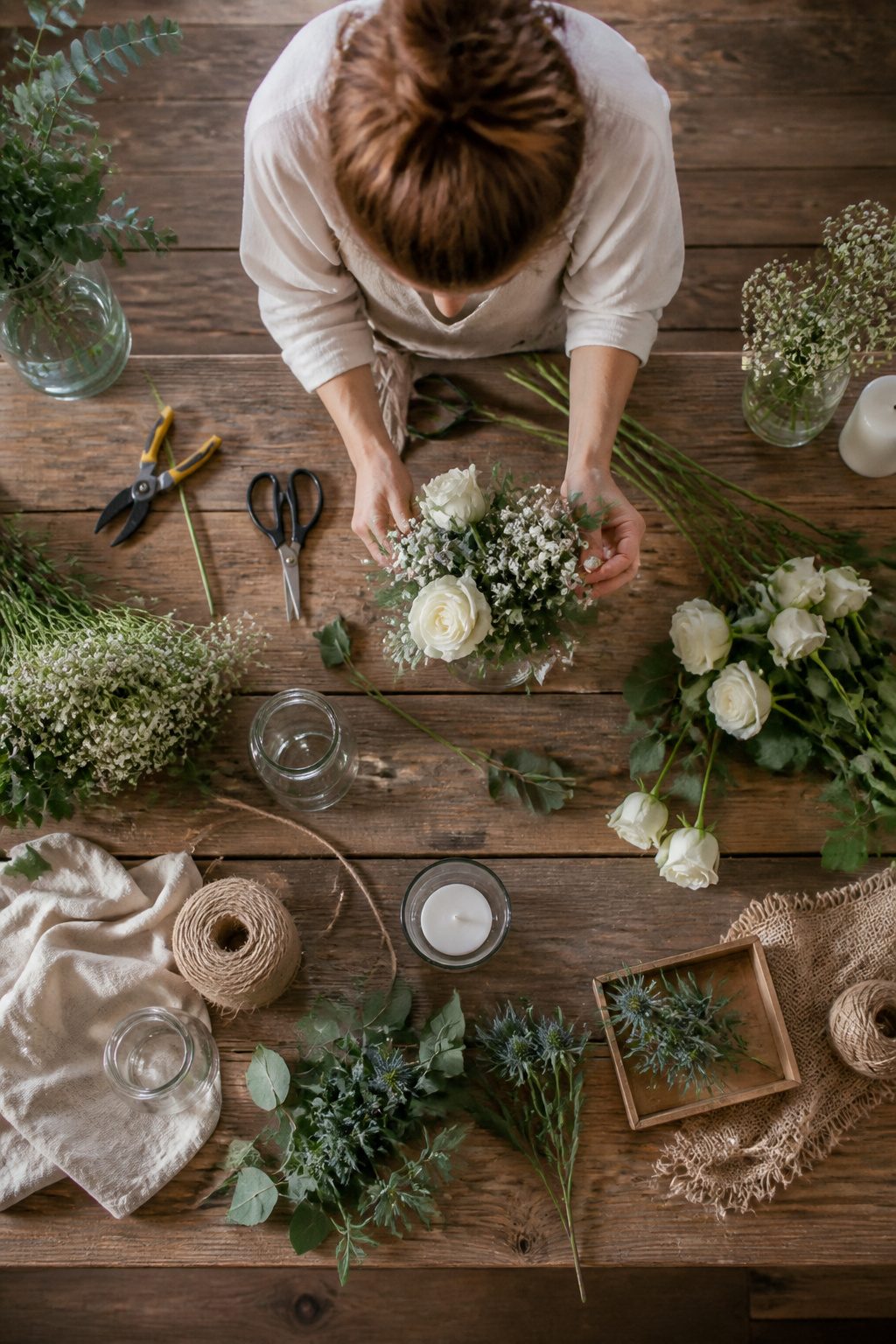 A collection of DIY wedding decorations and favor materials.