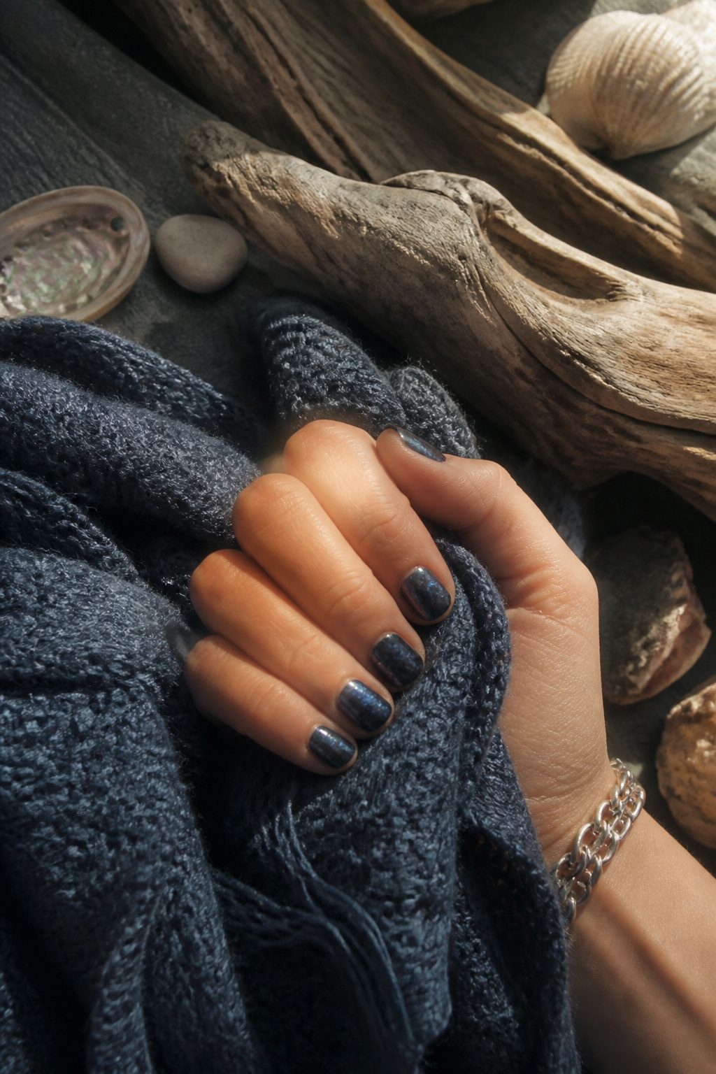 25 Short Nail Ideas for 2026: Designs You Can Actually Try 8 Short nails with a dark blue and silver fisherman core design.