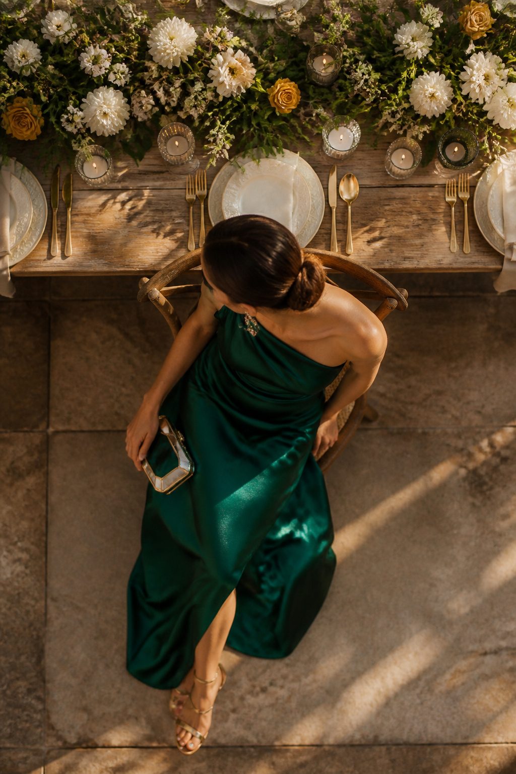 Various accessories displayed with wedding guest dresses.